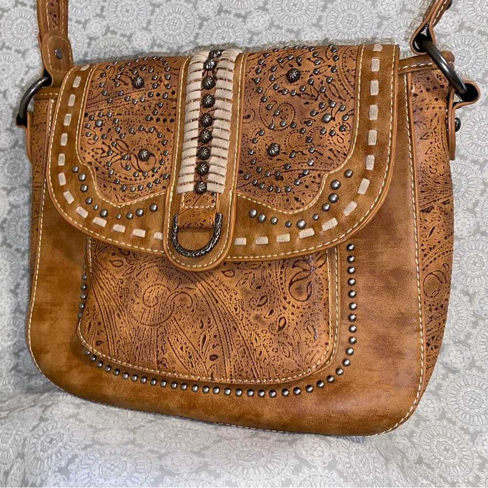 👜